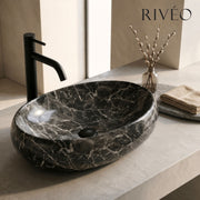 RIVÉO Oval Black Marble Effect Countertop Basin – 600 × 400 mm – With Drain