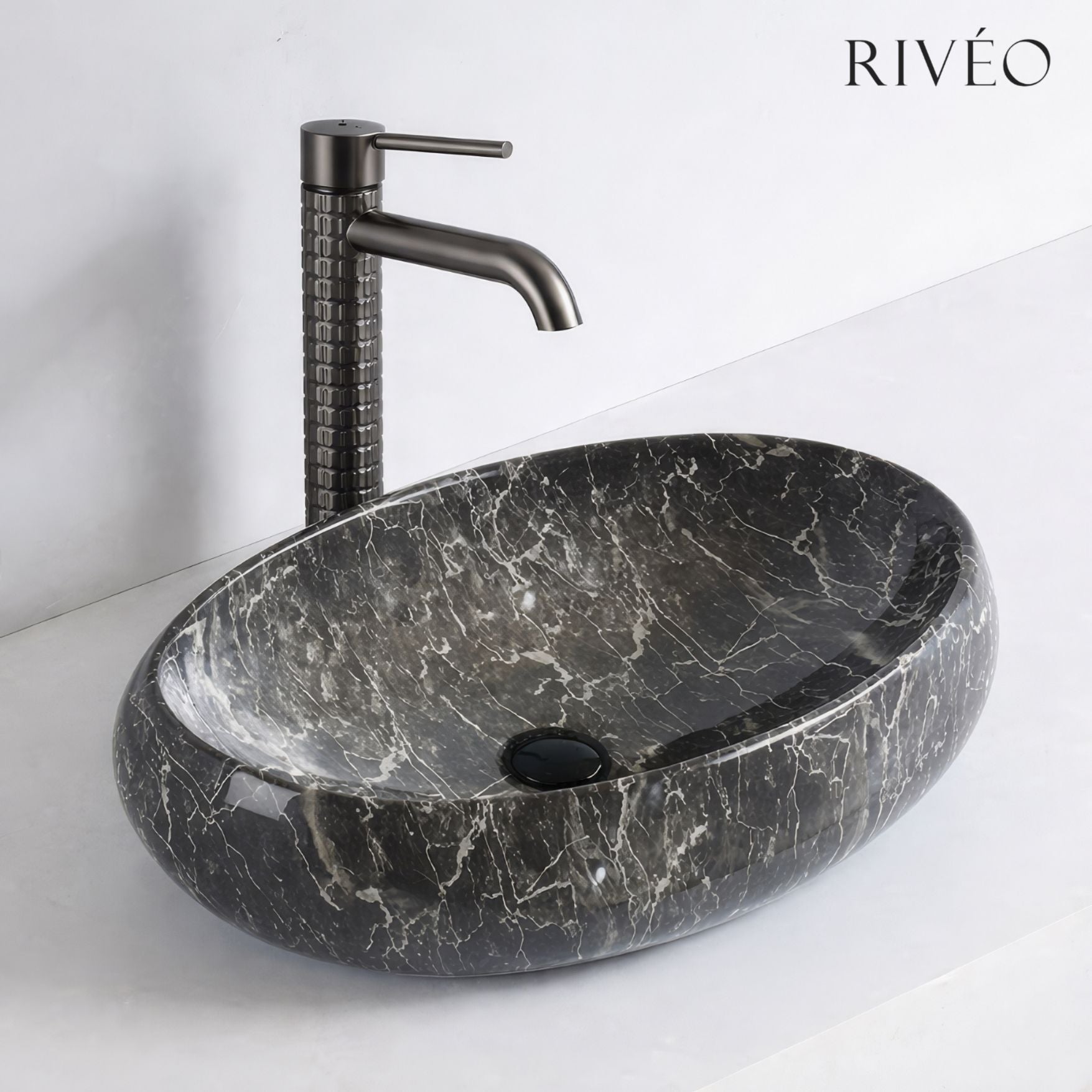 RIVÉO Oval Black Marble Effect Countertop Basin – 600 × 400 mm – With Drain