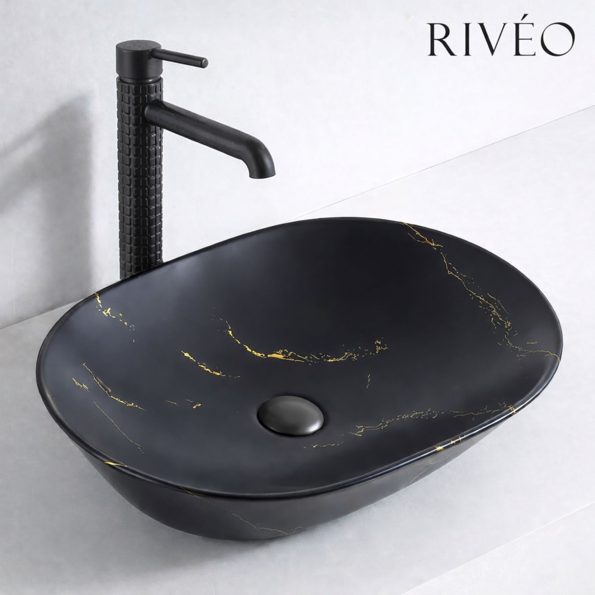 RIVÉO Oval Black Veined Gold Marble Countertop Basin – 590 × 425 mm – With Waste